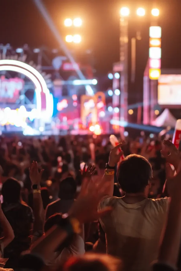 crowd-of-hands-up-concert-stage-lights-and-people-2023-11-27-04-57-23-utc